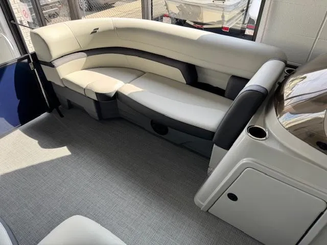 Slide: The Image of 2025 Starcraft EXS 3 Q boat interior with plush seating and modern design. - 8