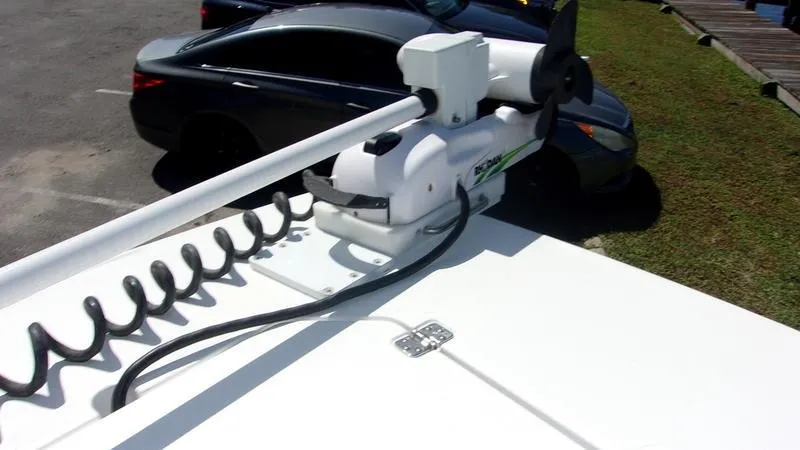 Slide: The Image of Crevalle 33 CSF Offshore Fishing boat, 2022 model, with trolling motor in parking lot. - 12