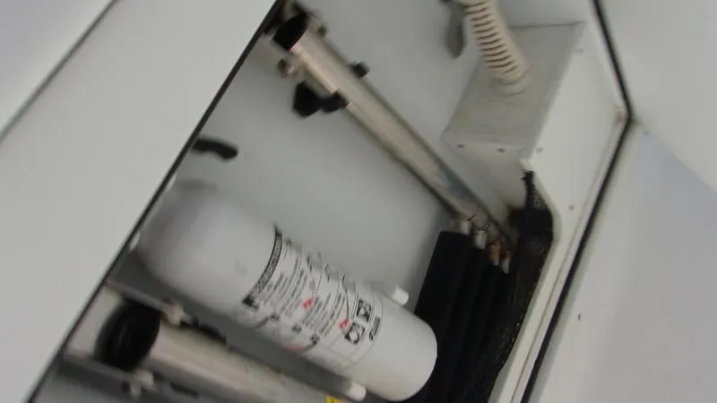 Slide: The Image of 2022 Crevalle 33 CSF Offshore Fishing boat interior equipment and storage compartment. - 14