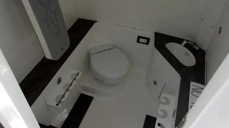 Slide: The Image of 2022 Crevalle 33 CSF Offshore Fishing boat interior bathroom with modern amenities. - 21