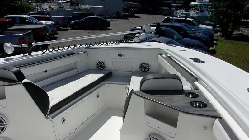 Slide: The Image of 2022 Crevalle 33 CSF Offshore Fishing boat interior with seating and storage. - 27