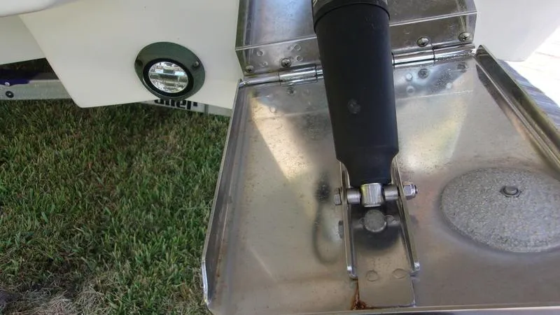 Slide: The Image of 2022 Crevalle 33 CSF Offshore Fishing boat trim tab detail. - 31