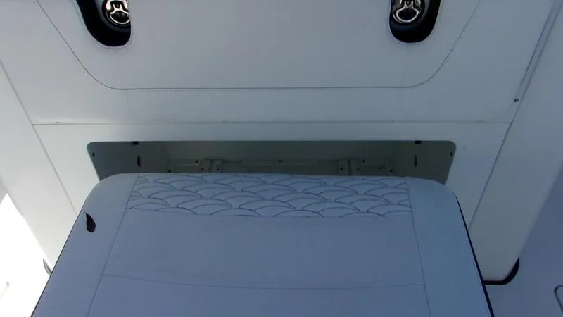 Slide: The Image of Crevalle 33 CSF Offshore Fishing boat interior, 2022 model, featuring detailed upholstery design. - 19