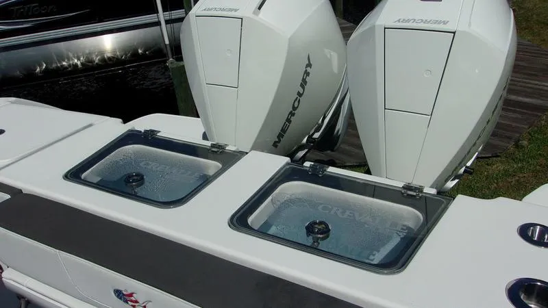 Slide: The Image of 2022 Crevalle 33 CSF Offshore Fishing boat with dual Mercury engines. - 29
