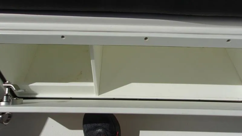 Slide: The Image of 2022 Crevalle 33 CSF Offshore Fishing boat storage compartment detail. - 30