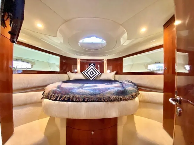Slide: The Image of Luxurious cabin interior of 2007 Fairline Targa 52 yacht with plush bedding. - 5