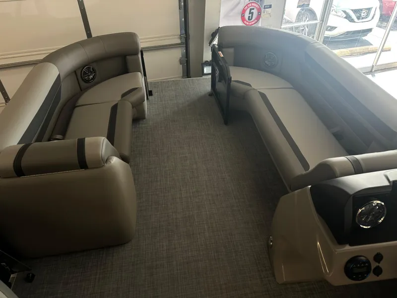 Slide: The Image of 2025 Premier 220 Sunscape boat interior with gray seating and modern design. - 18