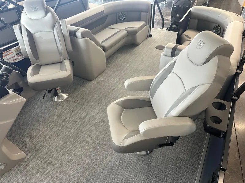 Slide: The Image of 2025 Premier 220 Sunscape boat interior with plush seating and modern design. - 20