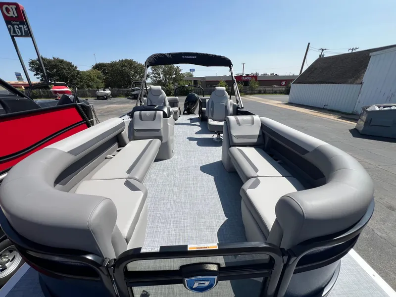 Slide: The Image of 2025 Premier 220 Sunscape pontoon boat with spacious seating and modern design. - 4