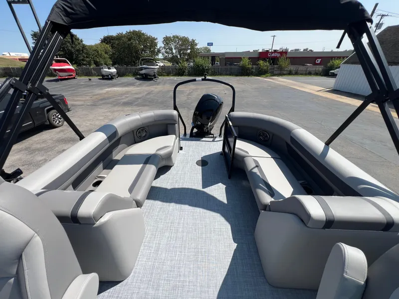 Slide: The Image of 2025 Premier 220 Sunscape pontoon boat with spacious seating and modern design. - 5