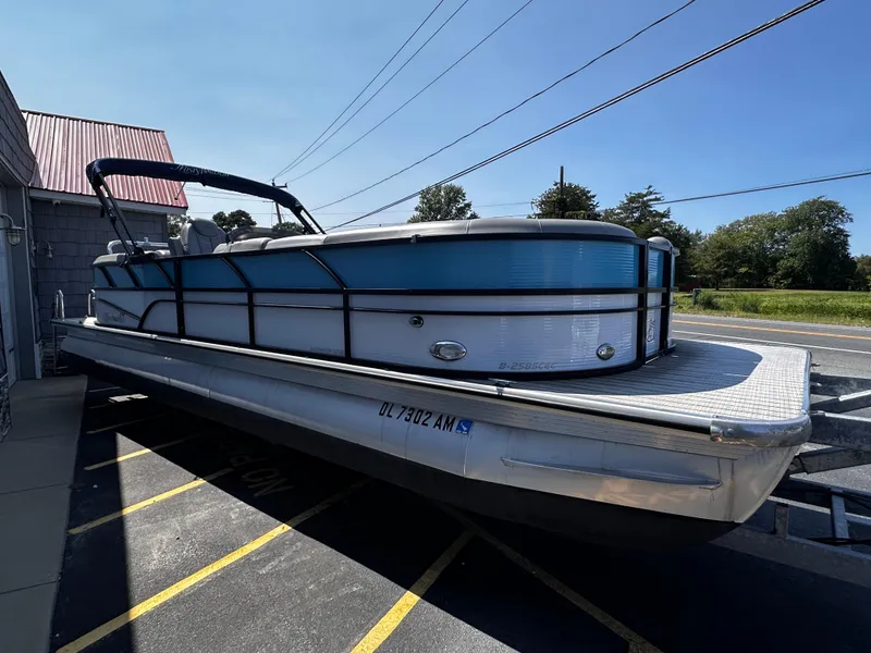 Slide: The Image of 2020 Misty Harbor 2585 Biscayne Bay CE pontoon boat parked outdoors. - 7