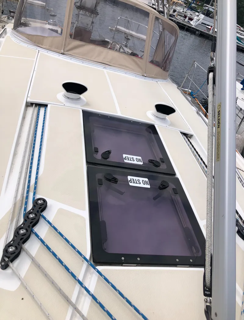 Slide: The Image of 2016 Marlow-Hunter 37 sailboat deck with hatches and rigging. - 13