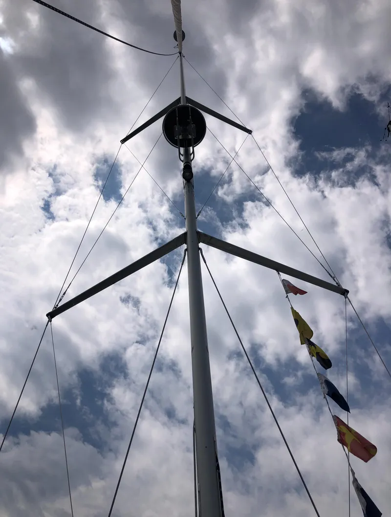 Slide: The Image of Marlow-Hunter 37 sailboat mast against cloudy sky, 2016 model. - 22