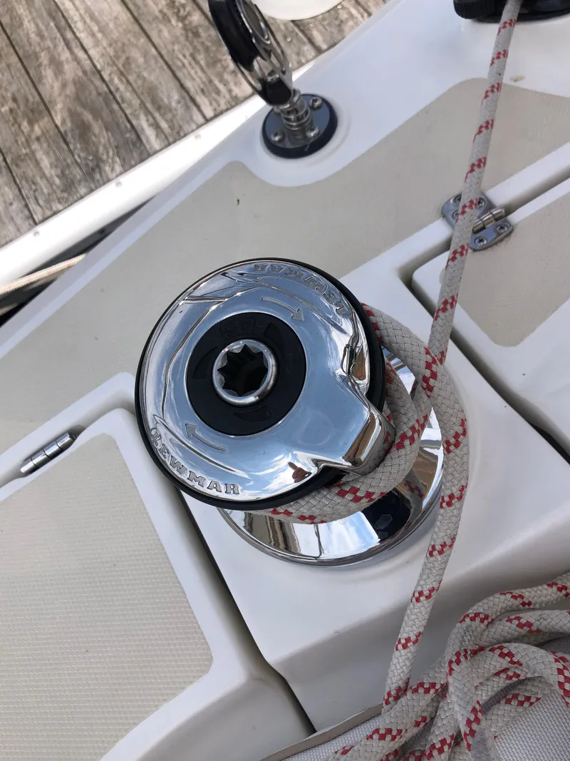 Slide: The Image of Chrome winch on 2016 Marlow-Hunter 37 sailboat deck with rope. - 40