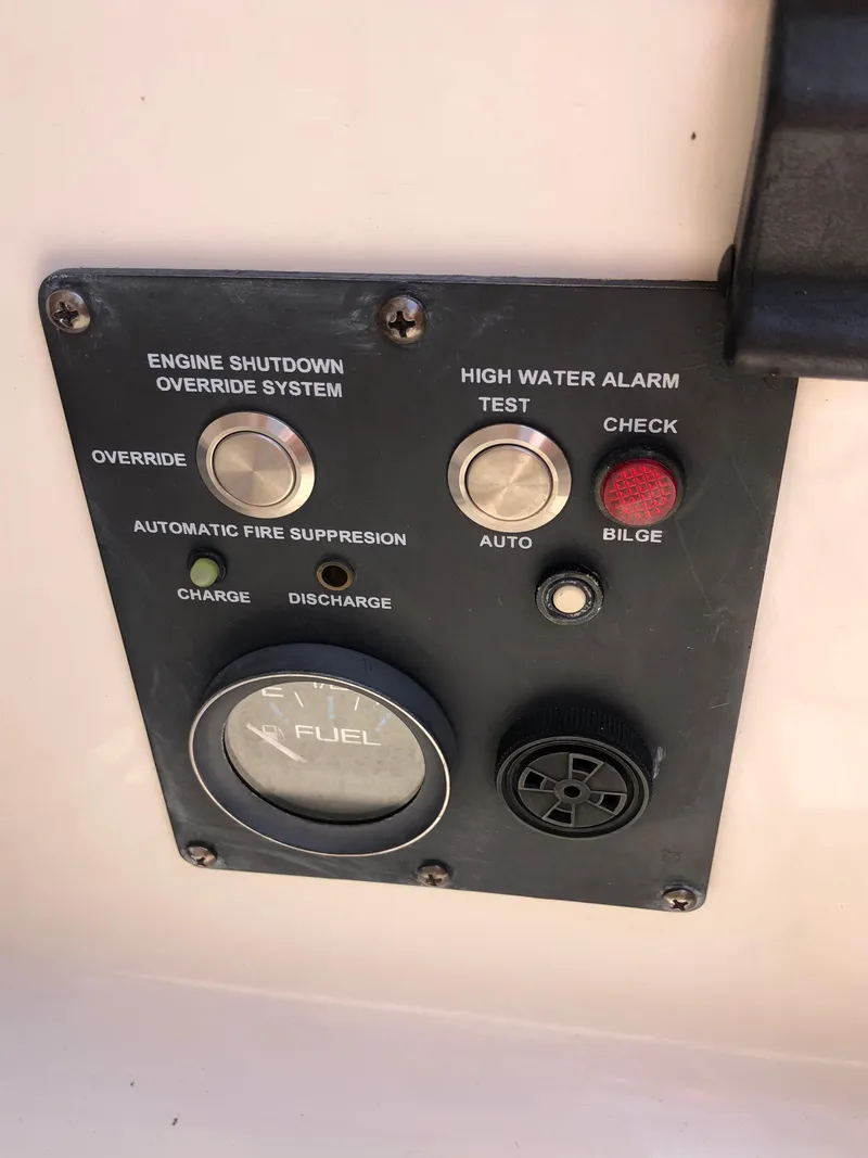 Slide: The Image of Control panel of a 2016 Marlow-Hunter 37 yacht with safety and fuel indicators. - 44
