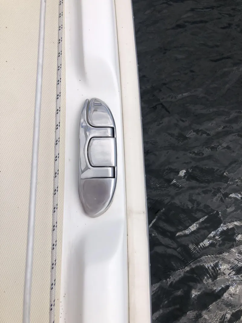 Slide: The Image of Marlow-Hunter 37 (2016) deck detail with cleat and textured surface. - 7