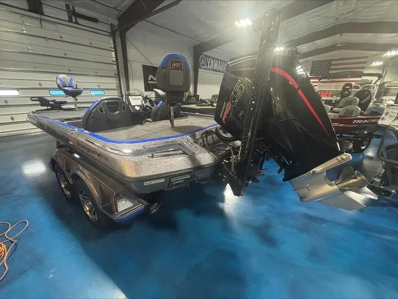 Slide: The Image of 2024 Ranger Z 521 R CUP ED boat in showroom, featuring sleek design and powerful engine. - 3