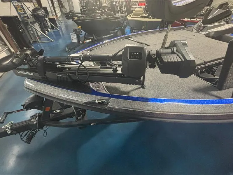 Slide: The Image of 2024 Ranger Z 521 R CUP ED boat with advanced trolling motor on display. - 8
