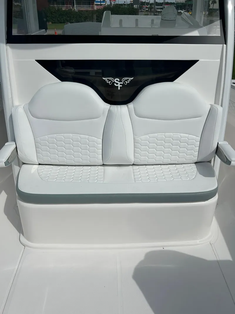 Slide: The Image of 2022 Stamas 33T Aventura boat seating with modern white upholstery. - 9