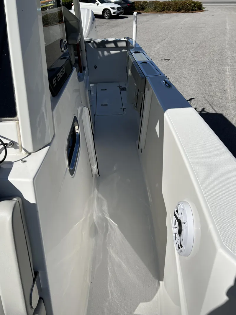 Slide: The Image of 2023 Pursuit S 288 boat deck with sleek design and modern features. - 13