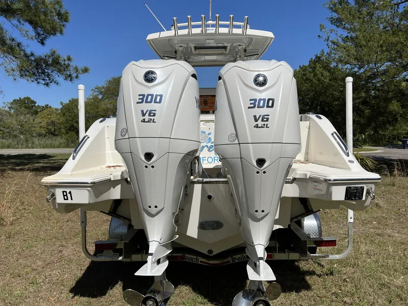 Slide: The Image of 2023 Pursuit S 288 boat with dual 300 V6 4.2L outboard engines. - 27