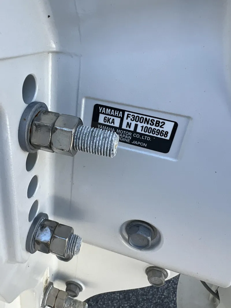 Slide: The Image of Close-up of Yamaha F300NSB2 engine label on 2023 Pursuit S 288 boat. - 39