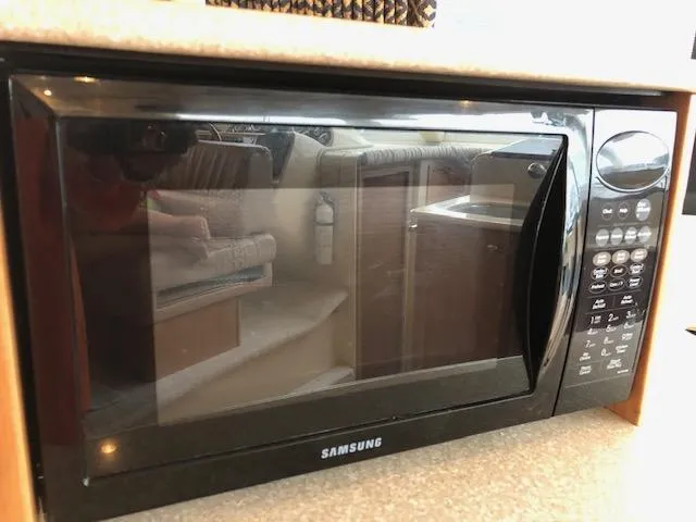 Slide: The Image of Samsung microwave in a 2003 Meridian 411 yacht kitchen interior. - 15