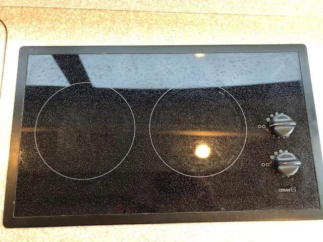 Slide: The Image of Ceramic cooktop with two burners and control knobs, Meridian 411, 2003 model. - 16