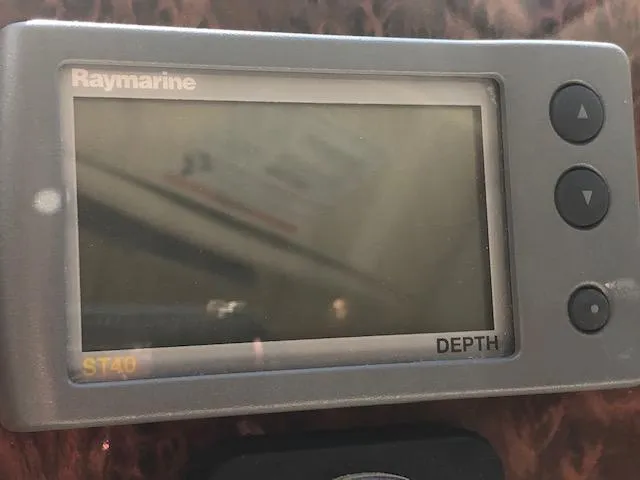 Slide: The Image of Raymarine ST40 depth display on 2003 Meridian 411 yacht dashboard. - 22