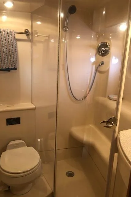 Slide: The Image of Bathroom interior of 2003 Meridian 411 yacht with shower and toilet. - 40