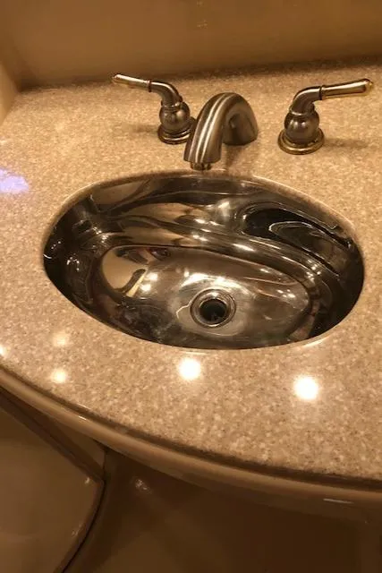 Slide: The Image of Stainless steel sink with dual faucets on a Meridian 411 yacht, 2003 model. - 42