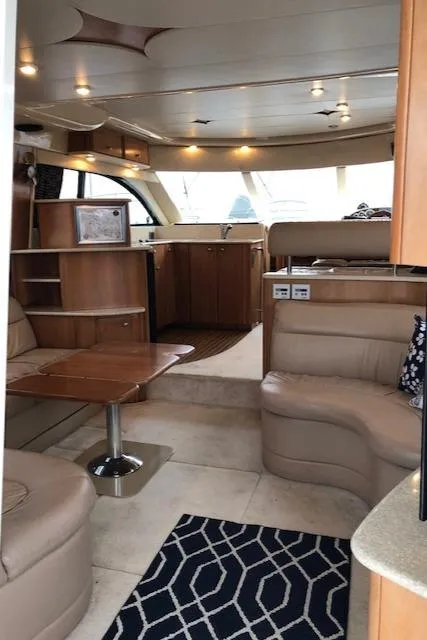 Slide: The Image of Luxurious interior of 2003 Meridian 411 yacht with modern furnishings and elegant design. - 5