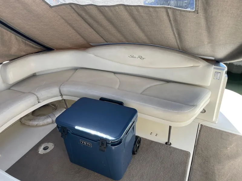 Slide: The Image of 2001 Sea Ray 380 Sundancer interior with seating and Yeti cooler. - 10