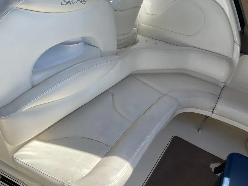 Slide: The Image of White leather seating on a 2001 Sea Ray 380 Sundancer boat. - 11