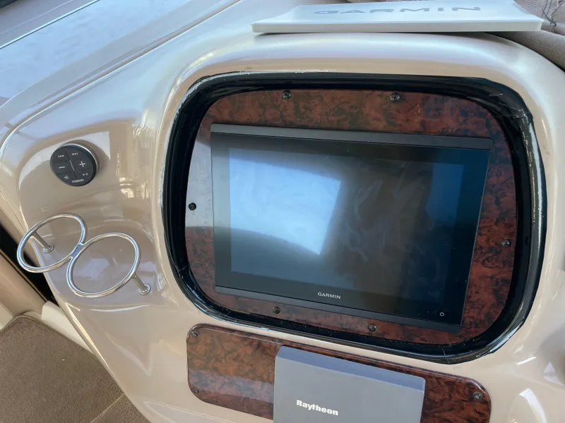 Slide: The Image of Garmin navigation system on 2001 Sea Ray 380 Sundancer boat dashboard. - 6