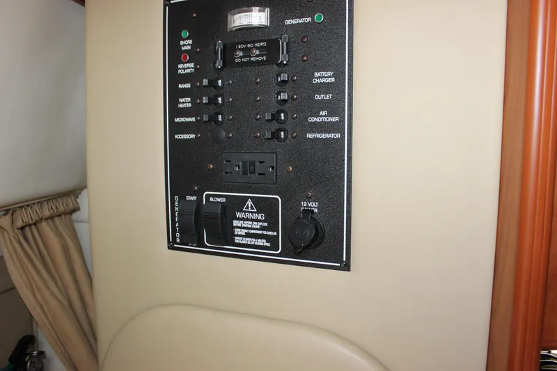 Slide: The Image of Control panel inside 2006 Rinker 270 Express Cruiser boat cabin. - 39