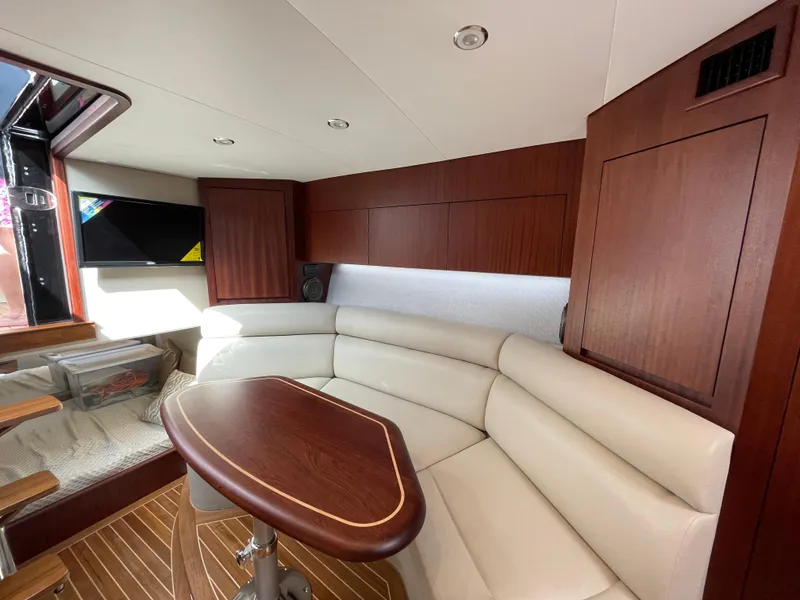 Slide: The Image of Luxurious interior of 2021 Jupiter 41 SB yacht with elegant seating and wood finishes. - 13