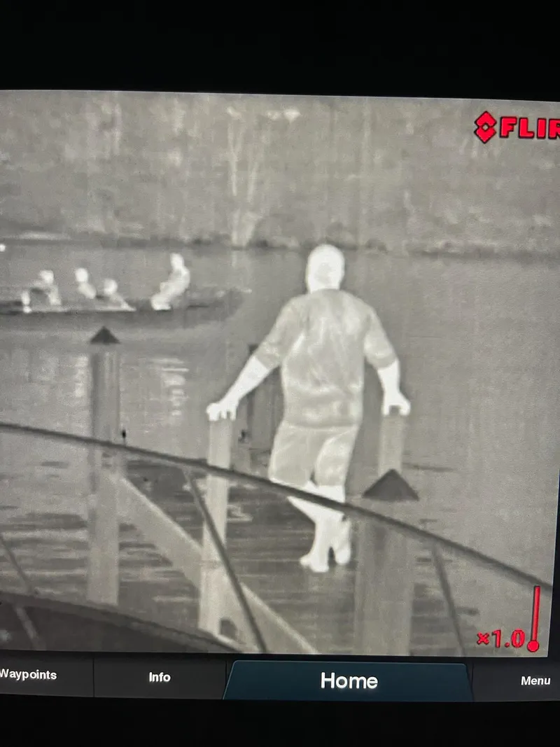 Slide: The Image of Thermal image showing people on a dock and boat, captured by Jupiter 41 SB, 2021. - 18