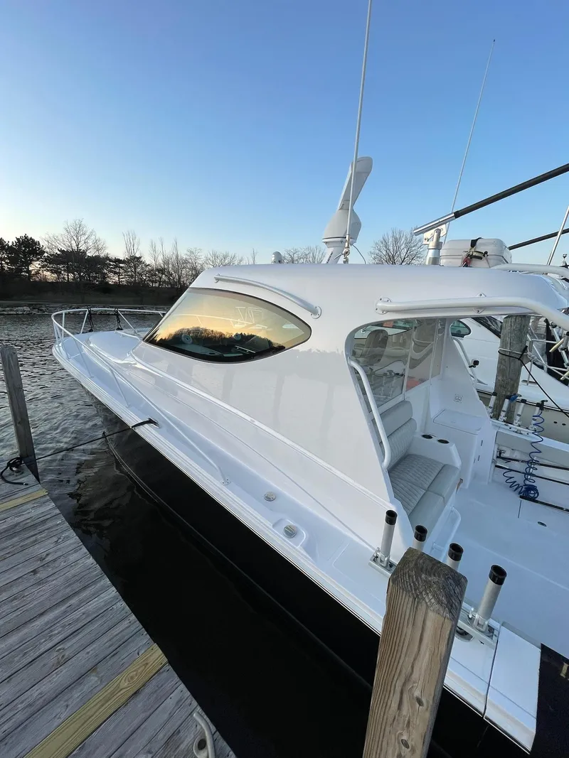 Slide: The Image of 2021 Jupiter 41 SB boat docked at sunset. - 21