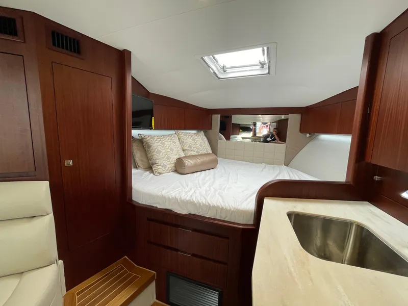 Slide: The Image of Luxurious cabin interior of 2021 Jupiter 41 SB yacht with bed and sink. - 8