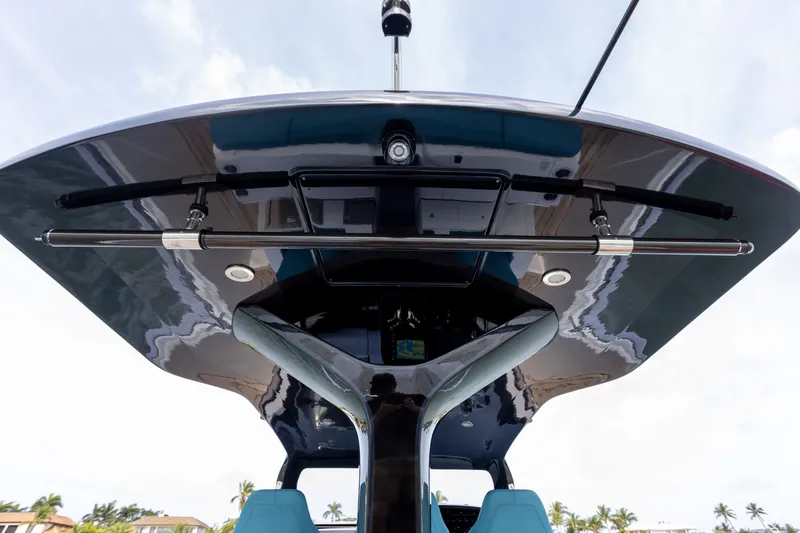 Slide: The Image of View of a modern SACS Rebel 47 roof from 2025 with blue seats underneath. - 34