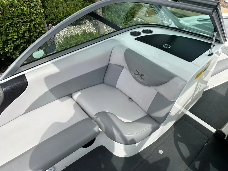 Slide: The Image of Interior of a 2008 MasterCraft X-1 boat with gray seating. - 12
