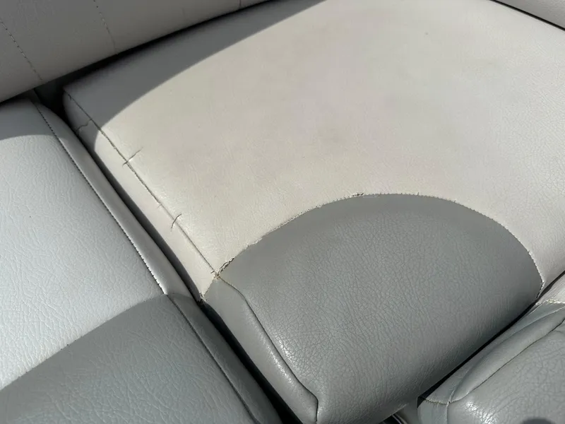 Slide: The Image of Close-up of 2008 MasterCraft X-1 seat upholstery showing wear. - 14