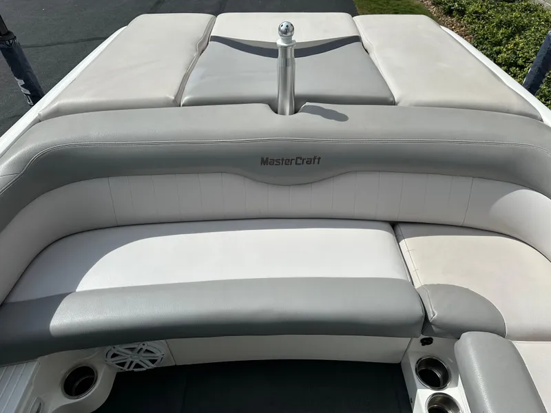Slide: The Image of Interior of a 2008 MasterCraft X-1 boat with gray upholstery. - 15