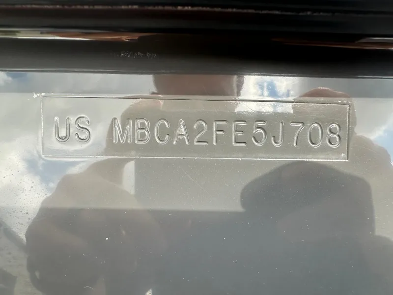 Slide: The Image of MasterCraft X-1 2008 serial number on metal plate. - 19