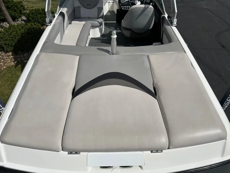 Slide: The Image of Interior of a 2008 MasterCraft X-1 boat with gray upholstery. - 7