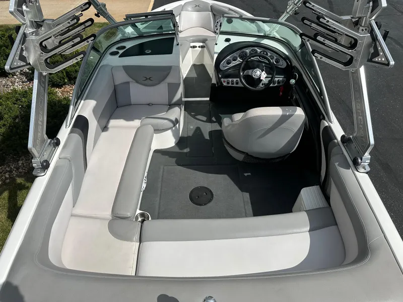 Slide: The Image of Interior of a 2008 MasterCraft X-1 boat with gray seating. - 9