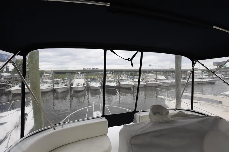 Slide: The Image of View from 1997 Mainship 34 Motor Yacht overlooking marina with multiple boats docked. - 17