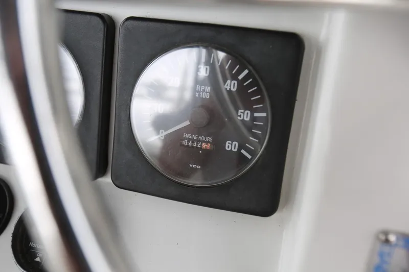 Slide: The Image of Close-up of 1997 Mainship 34 Motor Yacht RPM gauge on dashboard. - 30