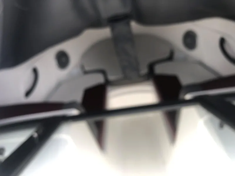 Slide: The Image of Interior view of 2022 Tahoe 185 S boat, featuring seating and storage areas. - 4